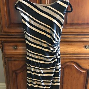 Black,grey, off white fully lined fitted dress.